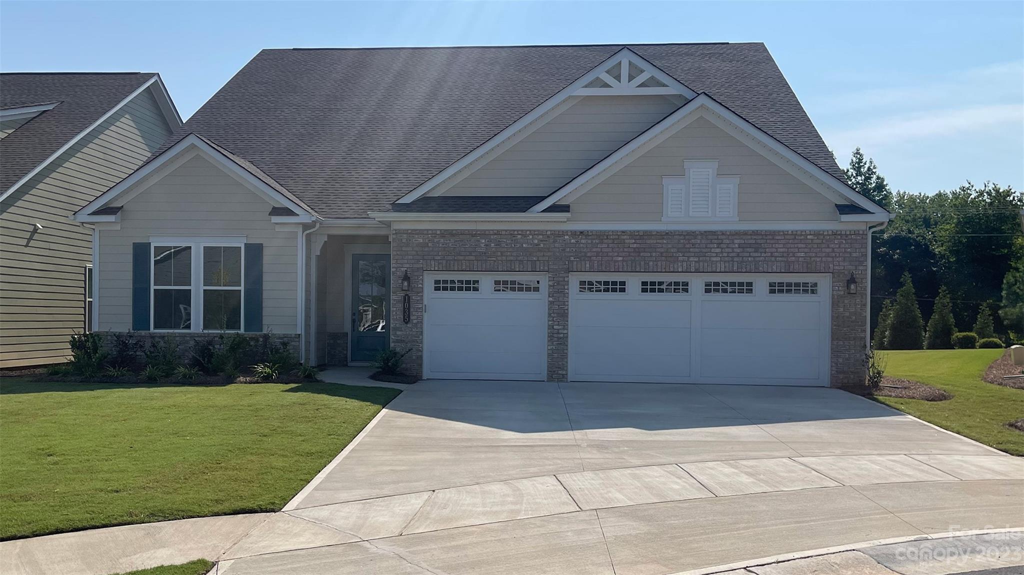 1035 Milestone Court Monroe, NC 28110 - Photo 1 of 9 a front view of house with yard
