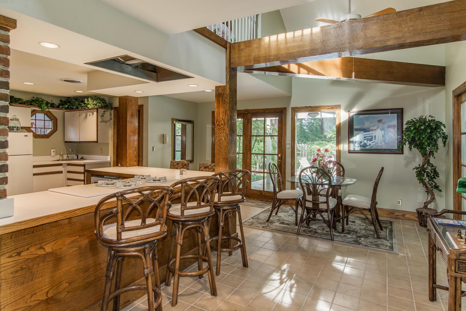 4334 Sneed Road Nashville, TN 37215 - Photo 30 of 30 a view of a dining room with furniture and chandelier
