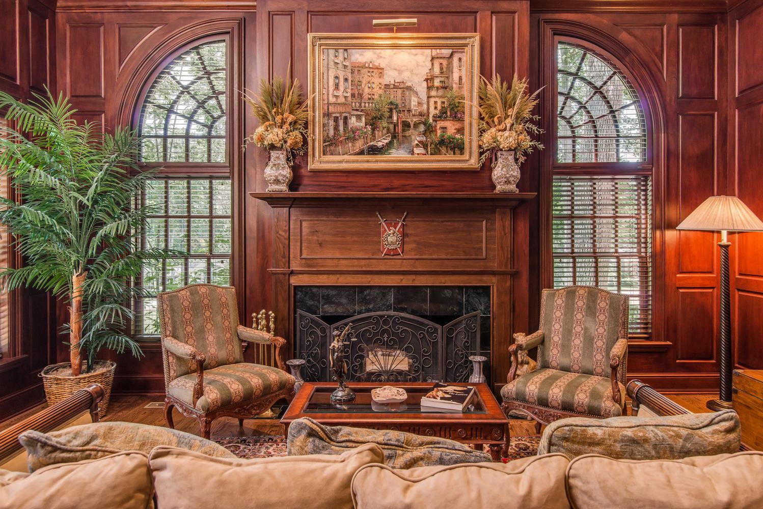 4334 Sneed Road Nashville, TN 37215 - Photo 3 of 30 a living room with furniture a fireplace and a large window