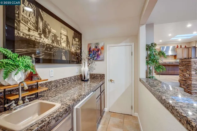 a bedroom with a bed and cabinet