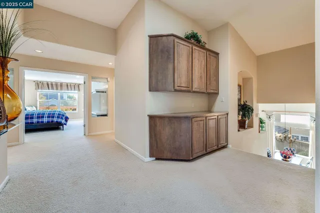 a bedroom with a bed and couch