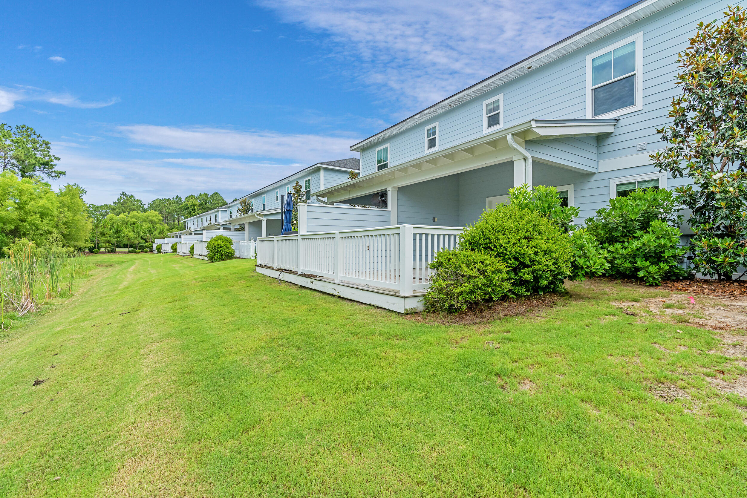 36 Golden Bell Ct Inlet Beach, Unit 36C Inlet Beach, FL 32461 - Photo 5 of 48 a view of a back yard of the house
