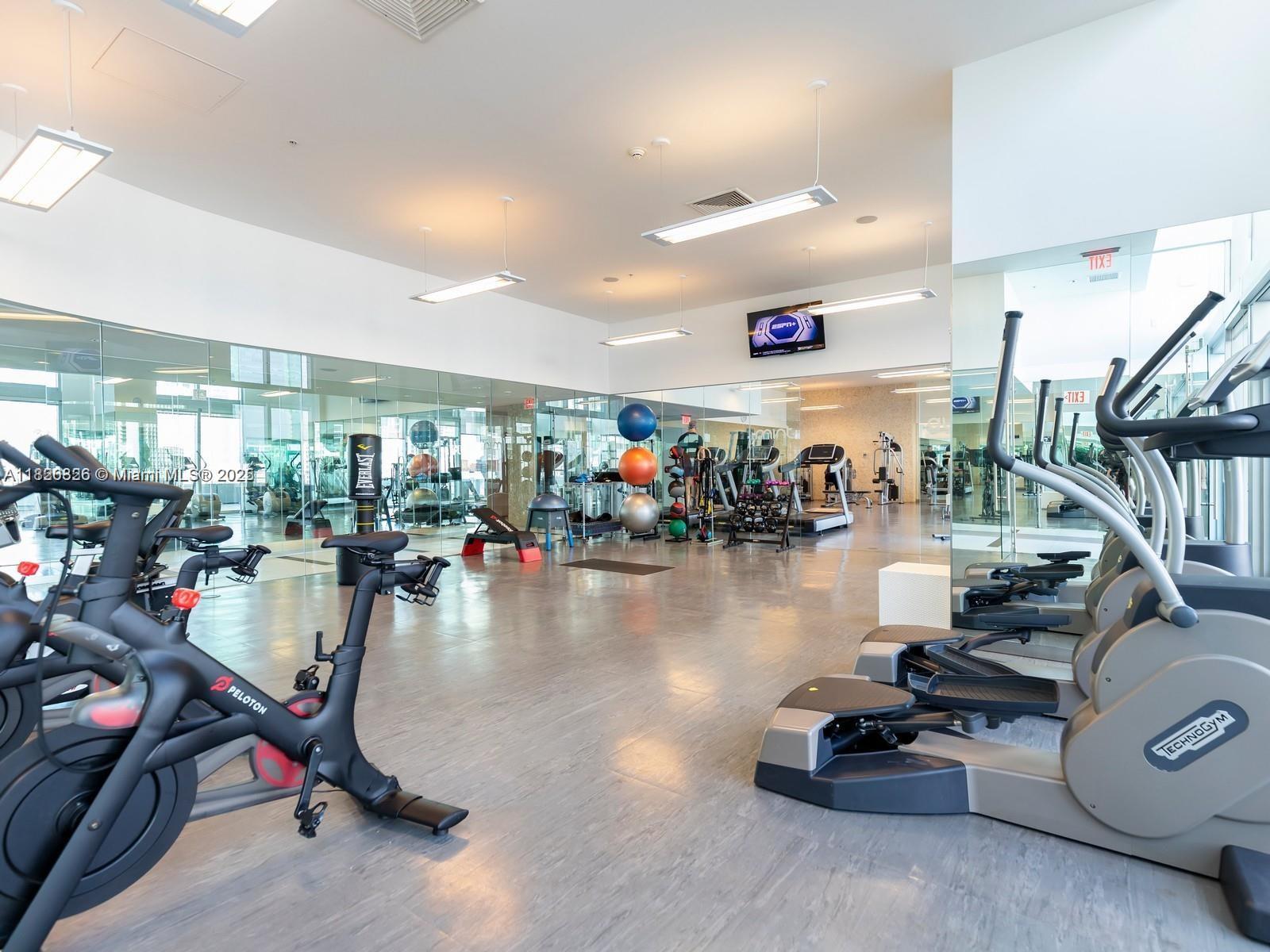 92 Southwest 3rd Street, Unit 3901 Miami, FL 33130 - Photo 10 of 10 a view of a room with gym equipment