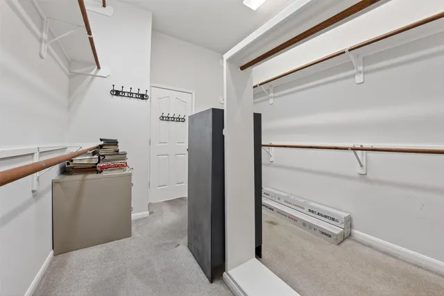 a view of a storage & utility room with closet