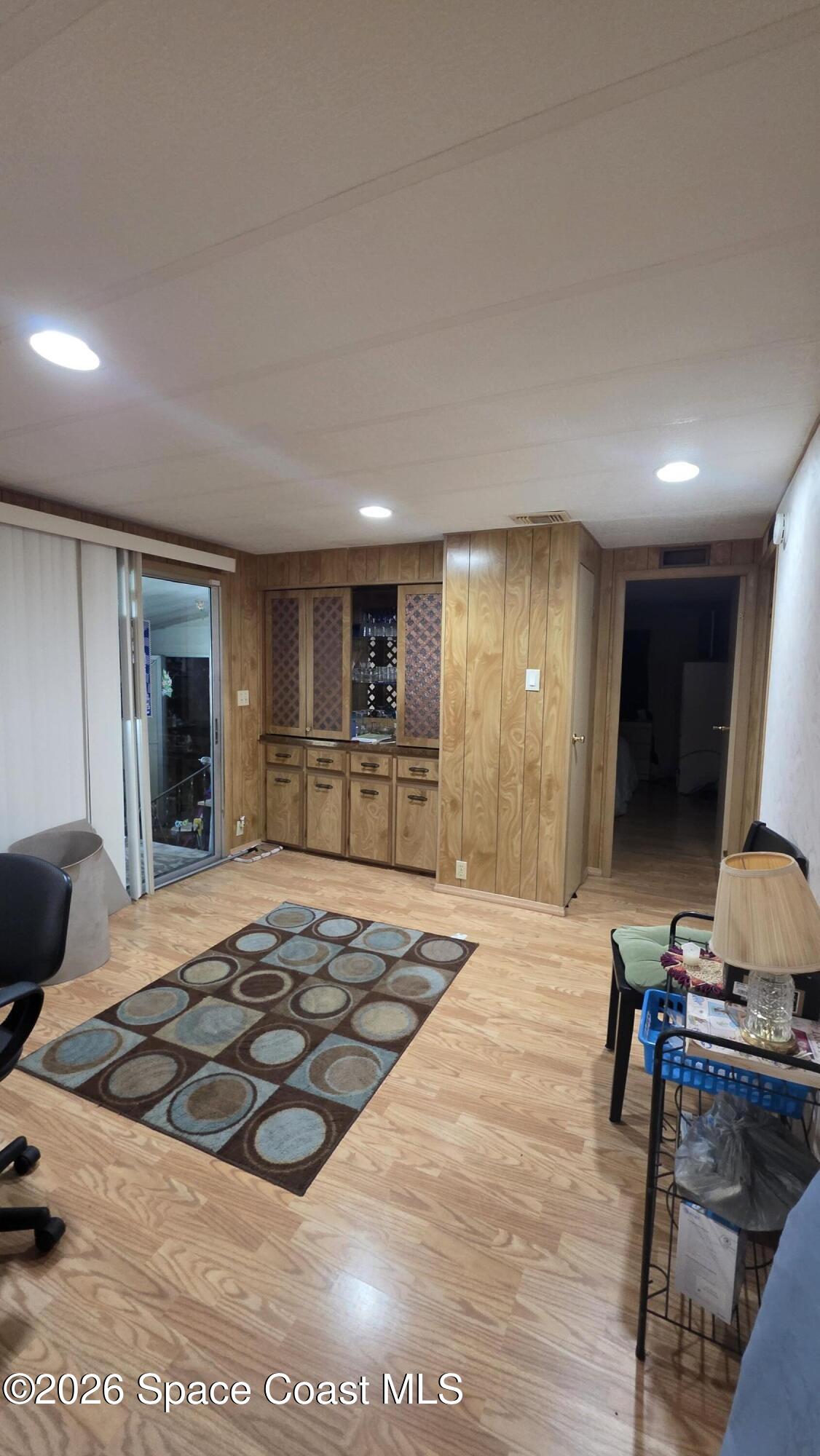 1805 Mango Street Northeast Palm Bay, FL 32905 - Photo 12 of 22 a living room with a couch and a table