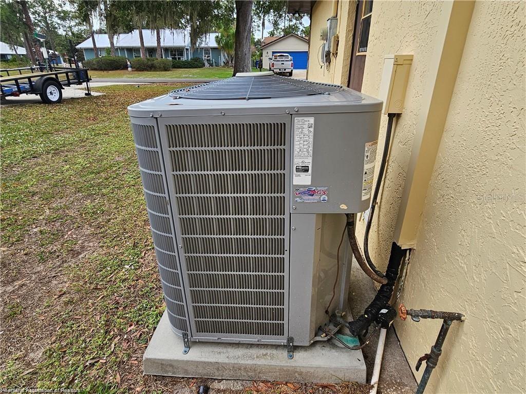 511 Elgin Street Sebring, FL 33875 - Photo 11 of 30 a view of a house with a sink and a yard