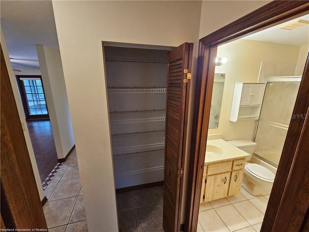 511 Elgin Street Sebring, FL 33875 - Photo 15 of 30 a view of walk in closet