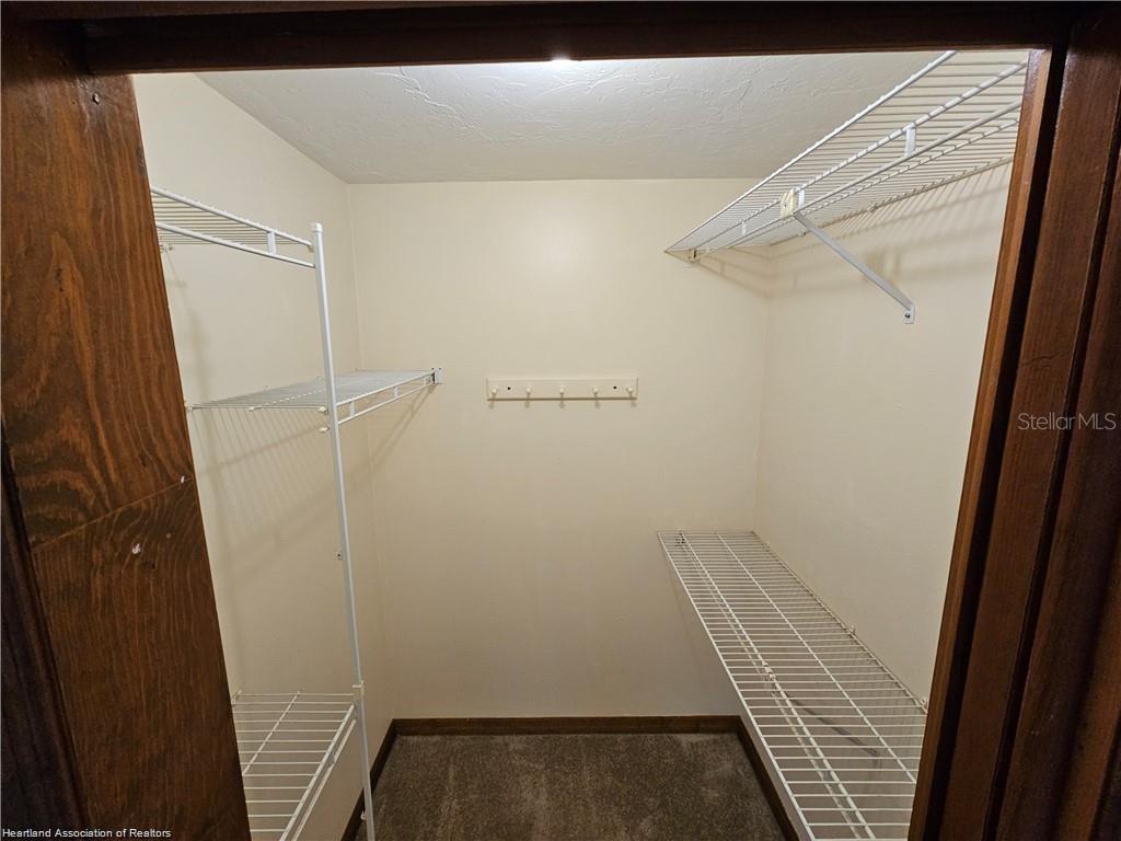 511 Elgin Street Sebring, FL 33875 - Photo 19 of 30 a view of walk in closet
