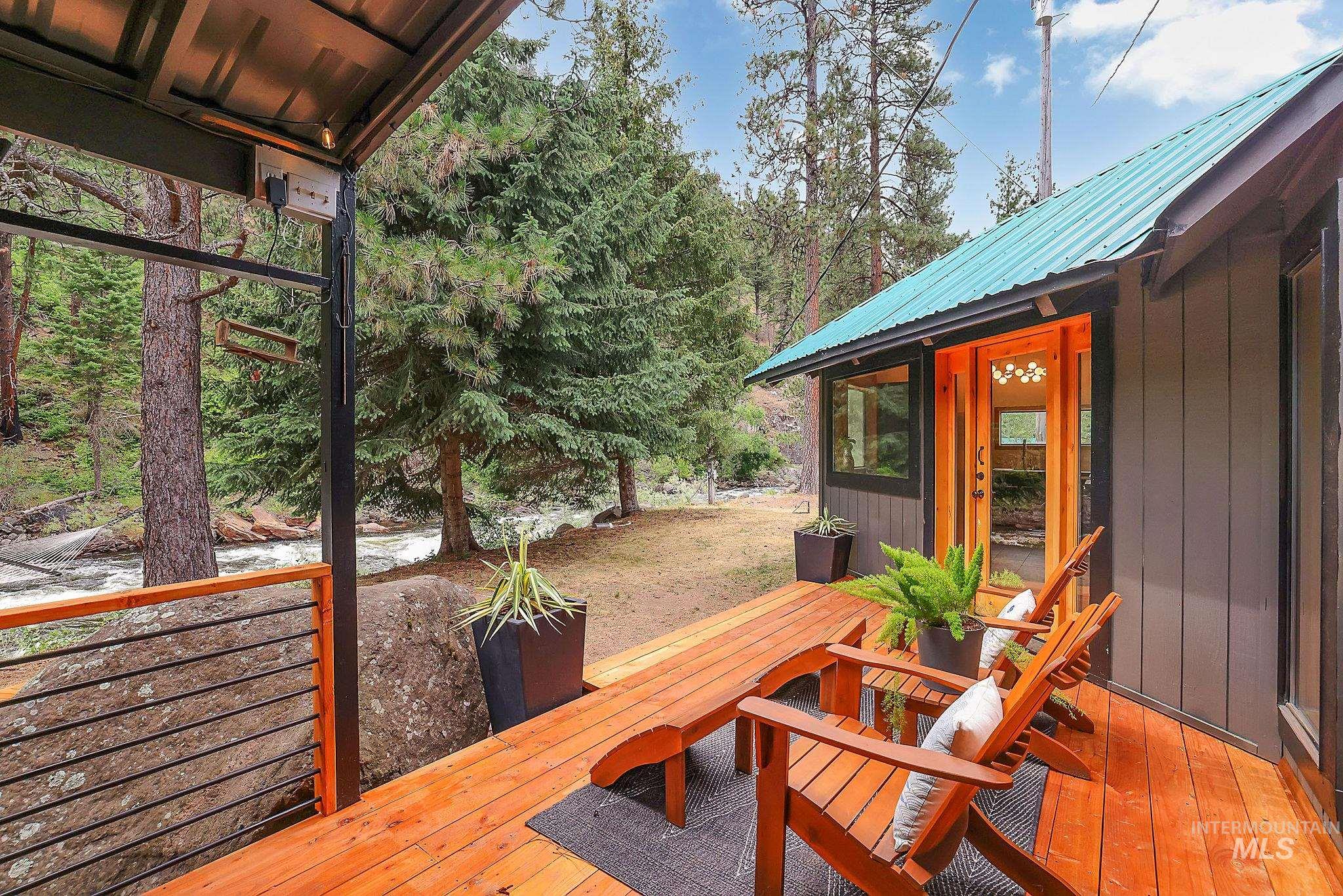 5713 Pines Road New Meadows, ID 83654 - Photo 15 of 45 Deck with outdoor dining area