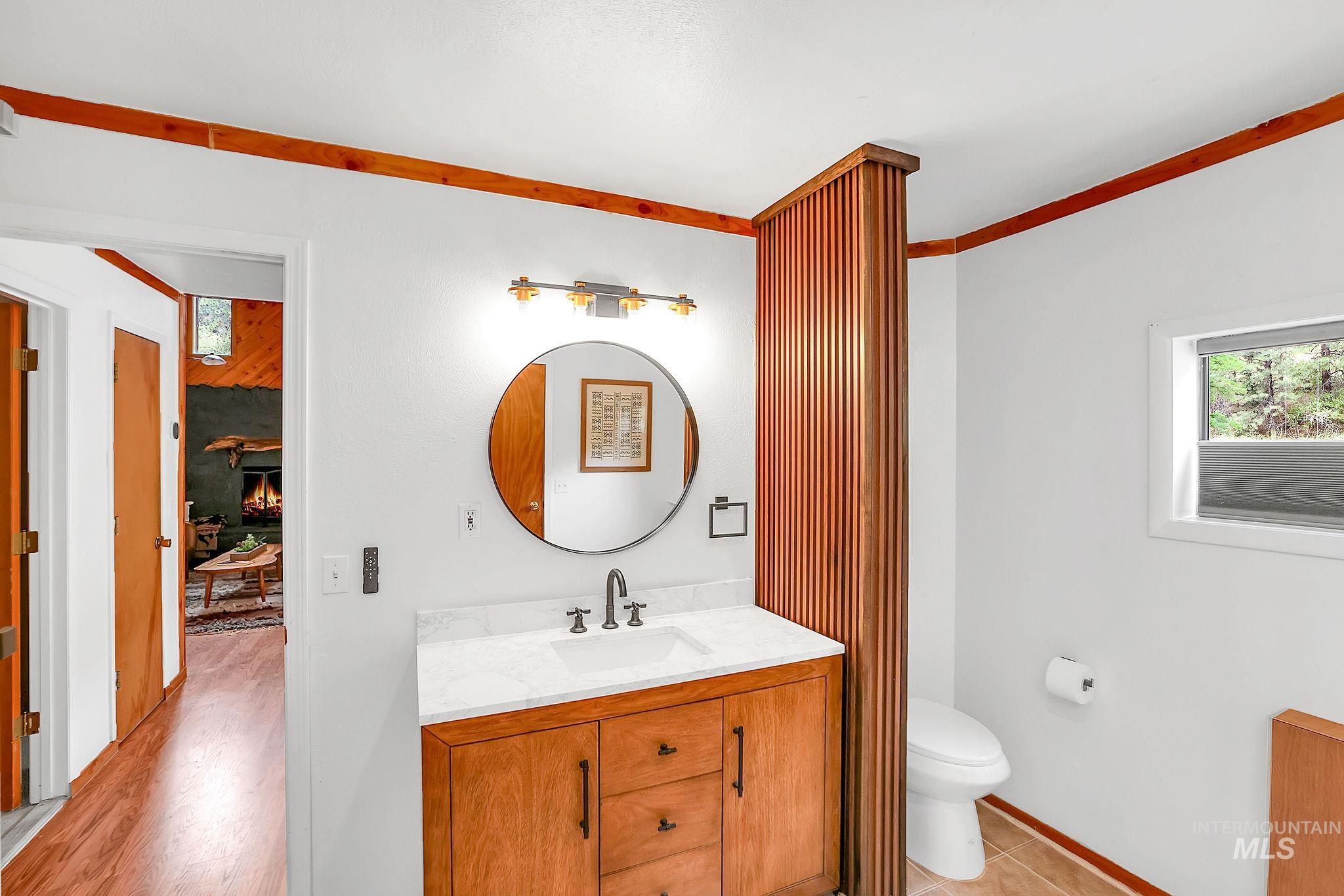 5713 Pines Road New Meadows, ID 83654 - Photo 22 of 45 Bathroom featuring vanity and toilet