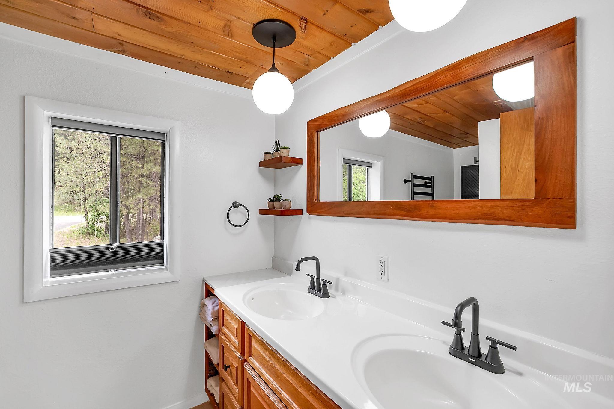5713 Pines Road New Meadows, ID 83654 - Photo 34 of 45 Full bath with wooden ceiling and double vanity