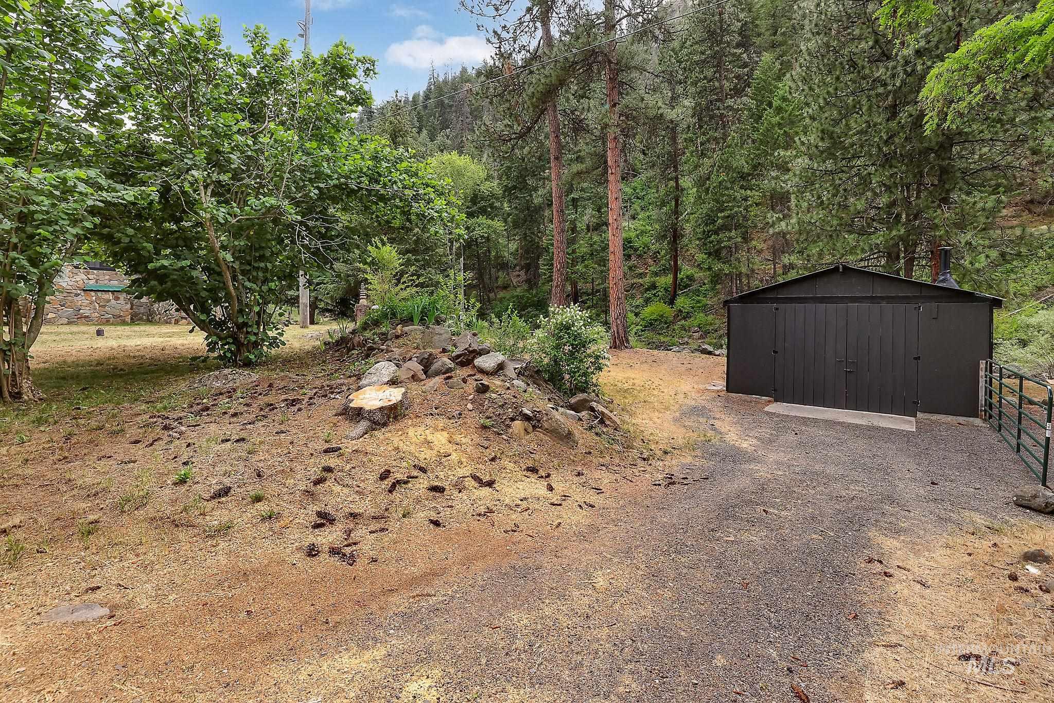 5713 Pines Road New Meadows, ID 83654 - Photo 42 of 45 View of yard with a storage unit