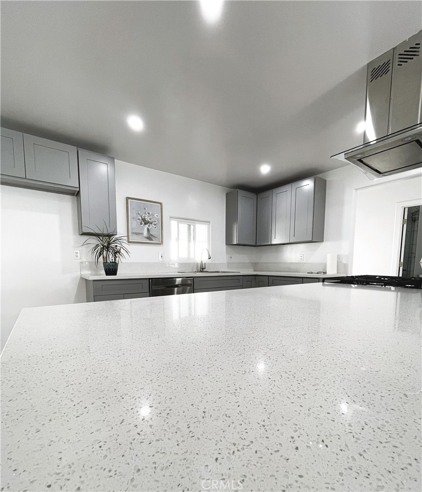 3745 Valley Boulevard Walnut, CA 91789 - Photo 4 of 10 a view of a kitchen with a sink and a refrigerator