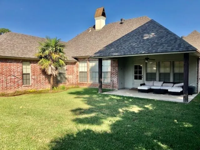 a house view with a garden space