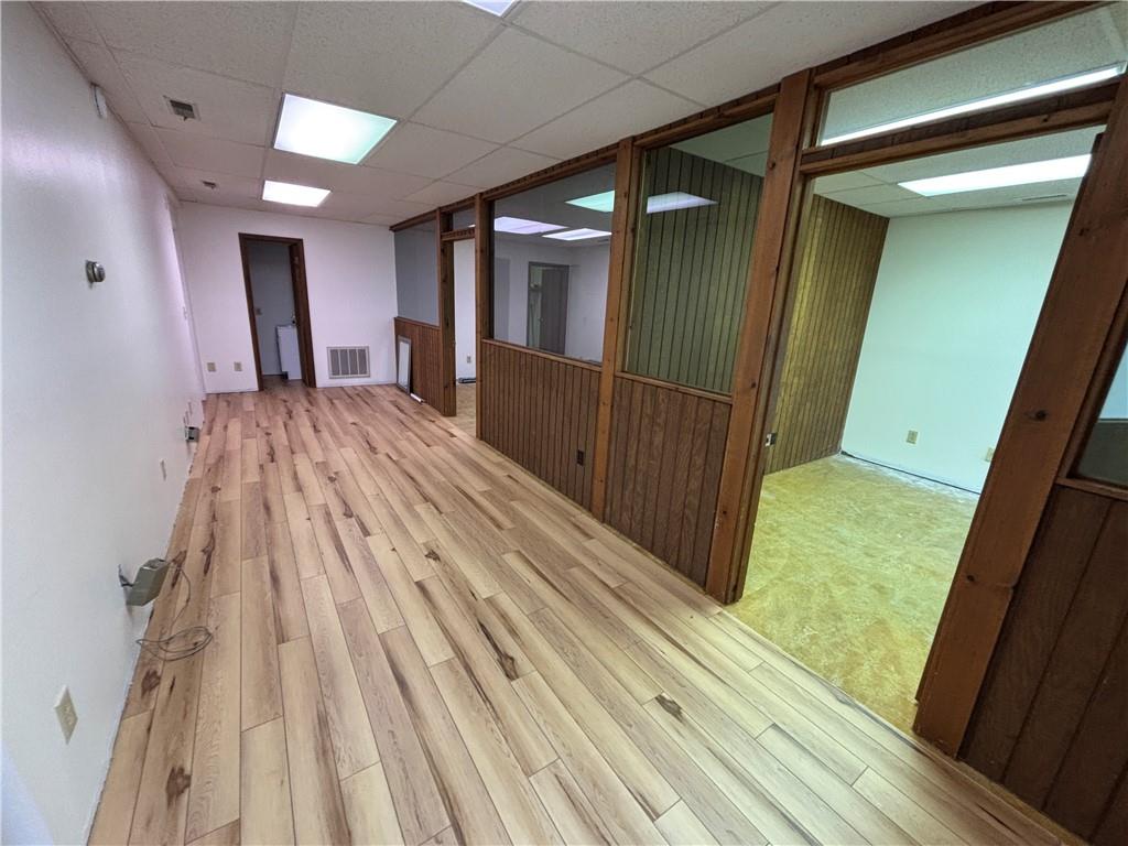 259 Pittsburgh Road, Unit 4 Butler, PA 16002 - Photo 5 of 11 a view of gallery with wooden floor