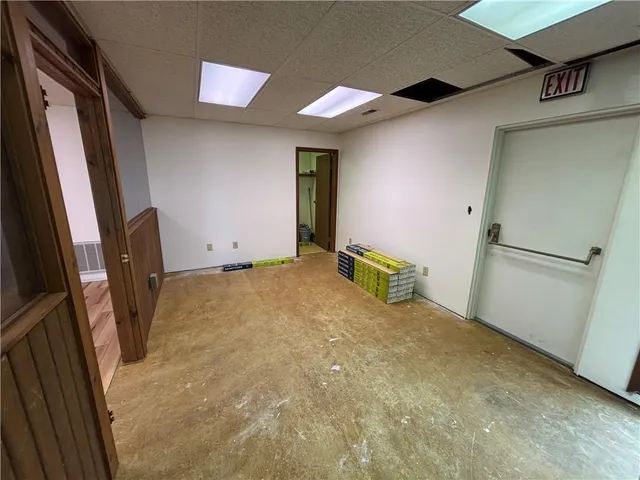 a bathroom with a toilet and a sink