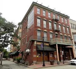 a view of a building with a street