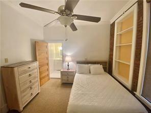 92 West Main Street, Unit 210 Uniontown, PA 15401 - Photo 11 of 13 a bedroom with a bed and ceiling fan