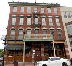 92 West Main Street, Unit 210 Uniontown, PA 15401 - Photo 2 of 13 a front view of a building with glass windows
