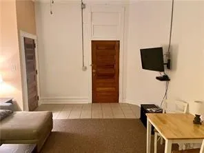 a living room with furniture and a table