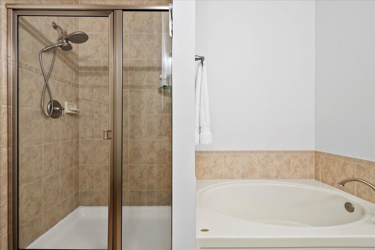251 Edenberry Avenue Jupiter, FL 33458 - Photo 15 of 31 a bathroom with a bathtub