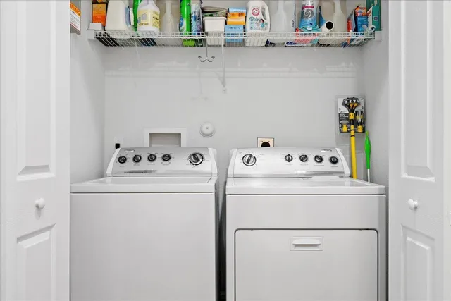 a utility room with dryer and washer
