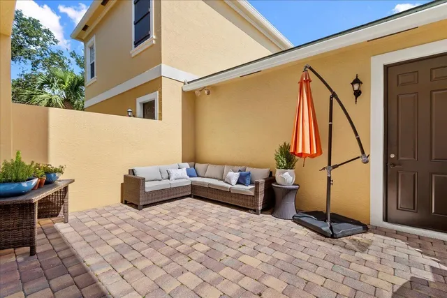 a view of balcony with furniture