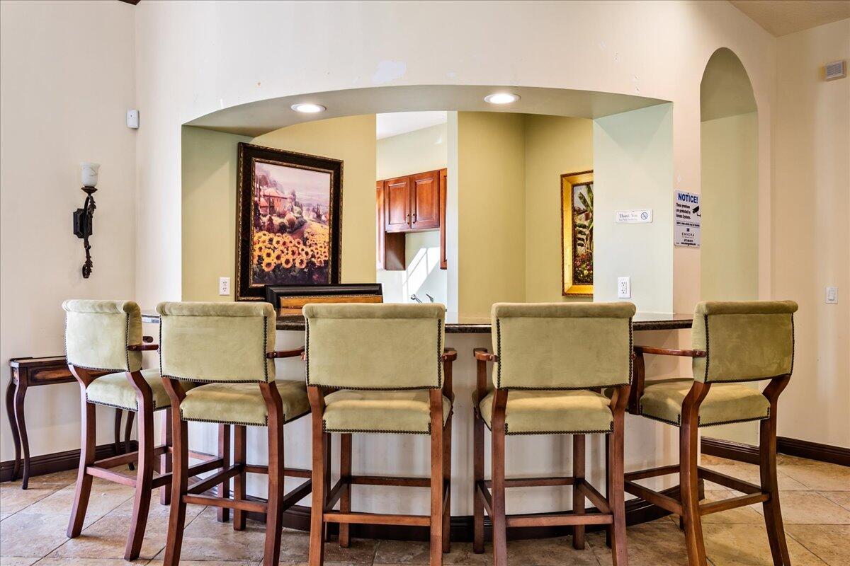 251 Edenberry Avenue Jupiter, FL 33458 - Photo 25 of 31 a view of a dining room with furniture and a window