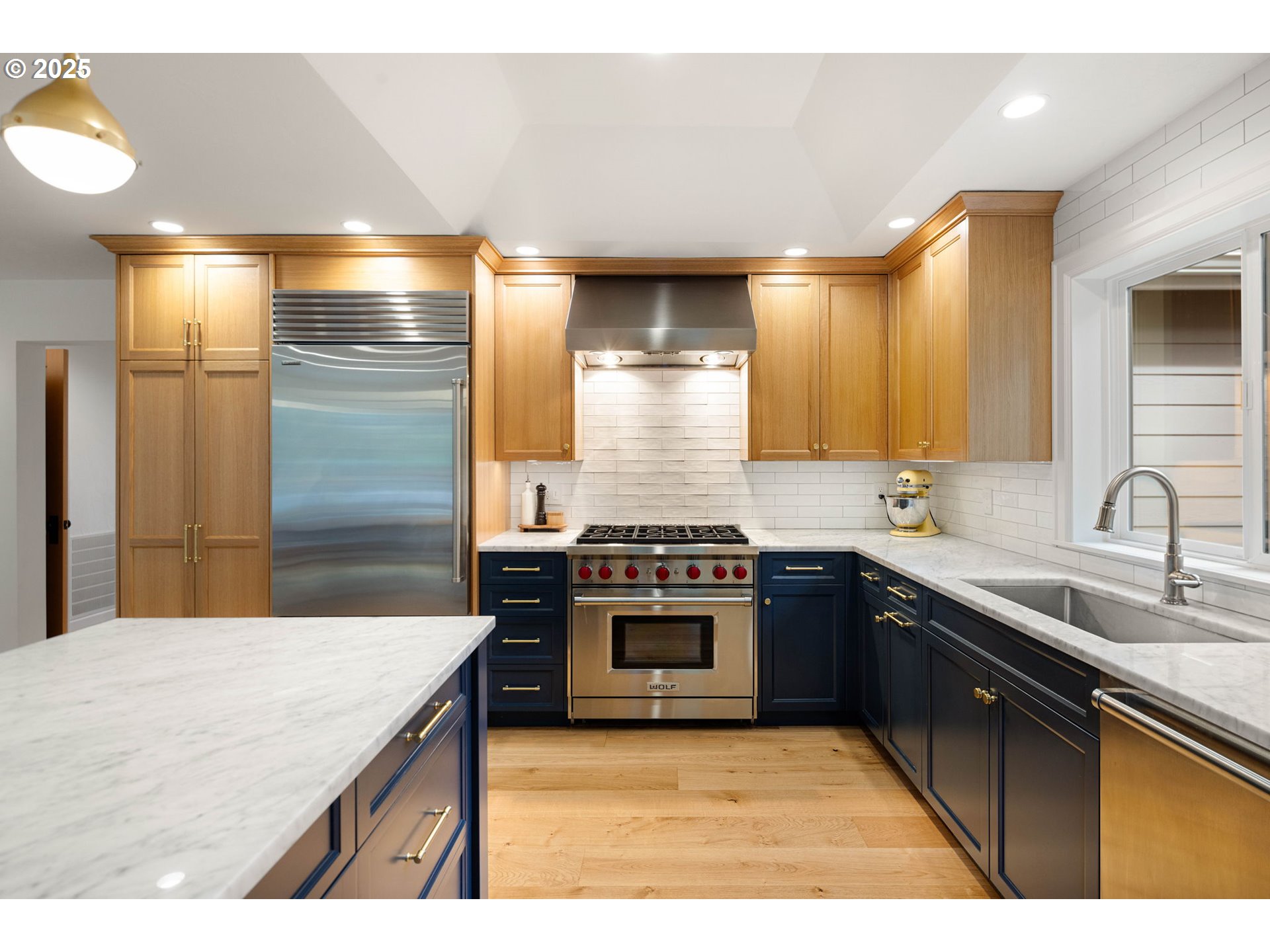 2214 West 25th Place Eugene, OR 97405 - Photo 15 of 48 a kitchen with stainless steel appliances granite countertop a sink stove and refrigerator