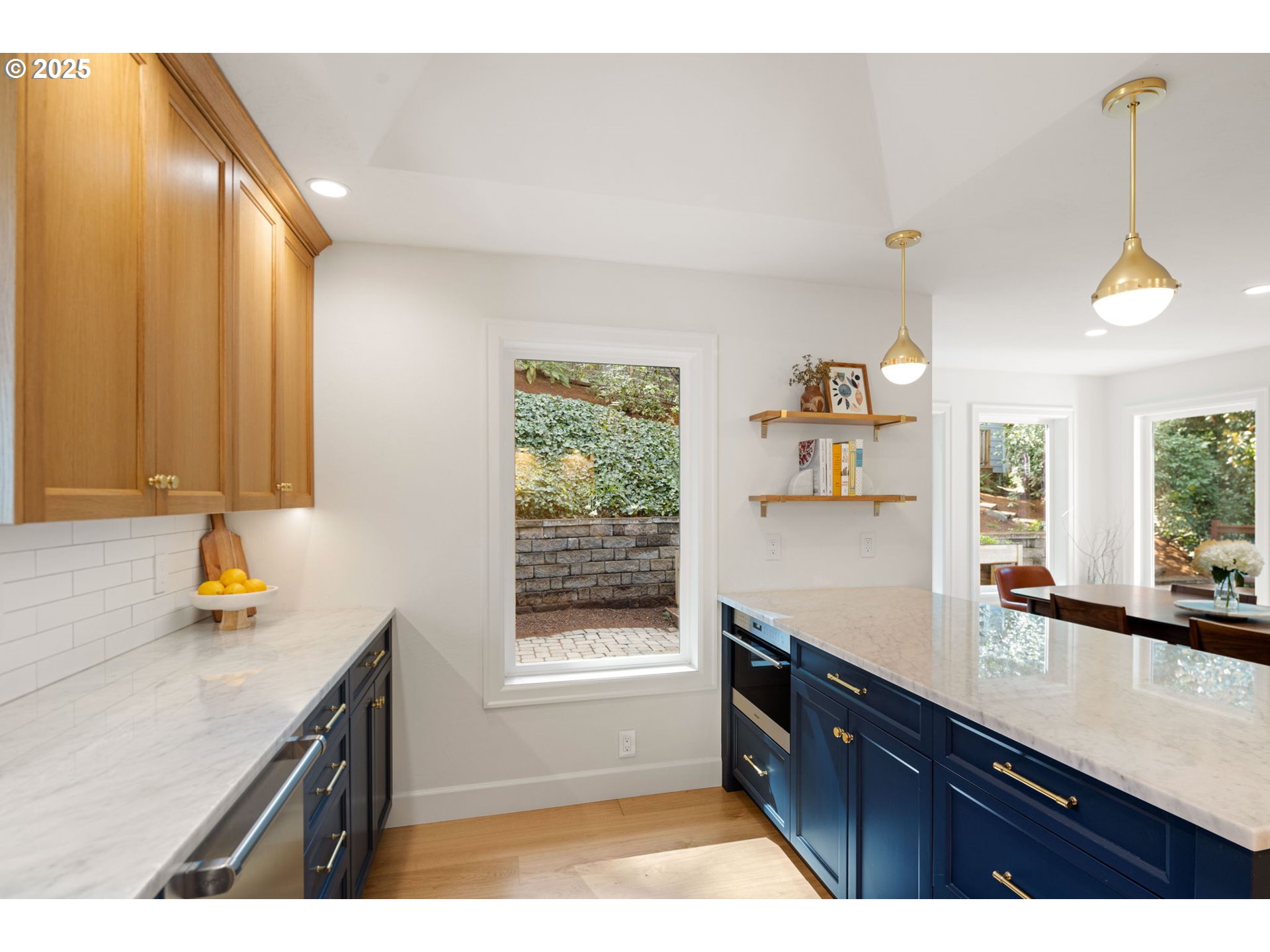 2214 West 25th Place Eugene, OR 97405 - Photo 16 of 48 a kitchen with a sink cabinets and window