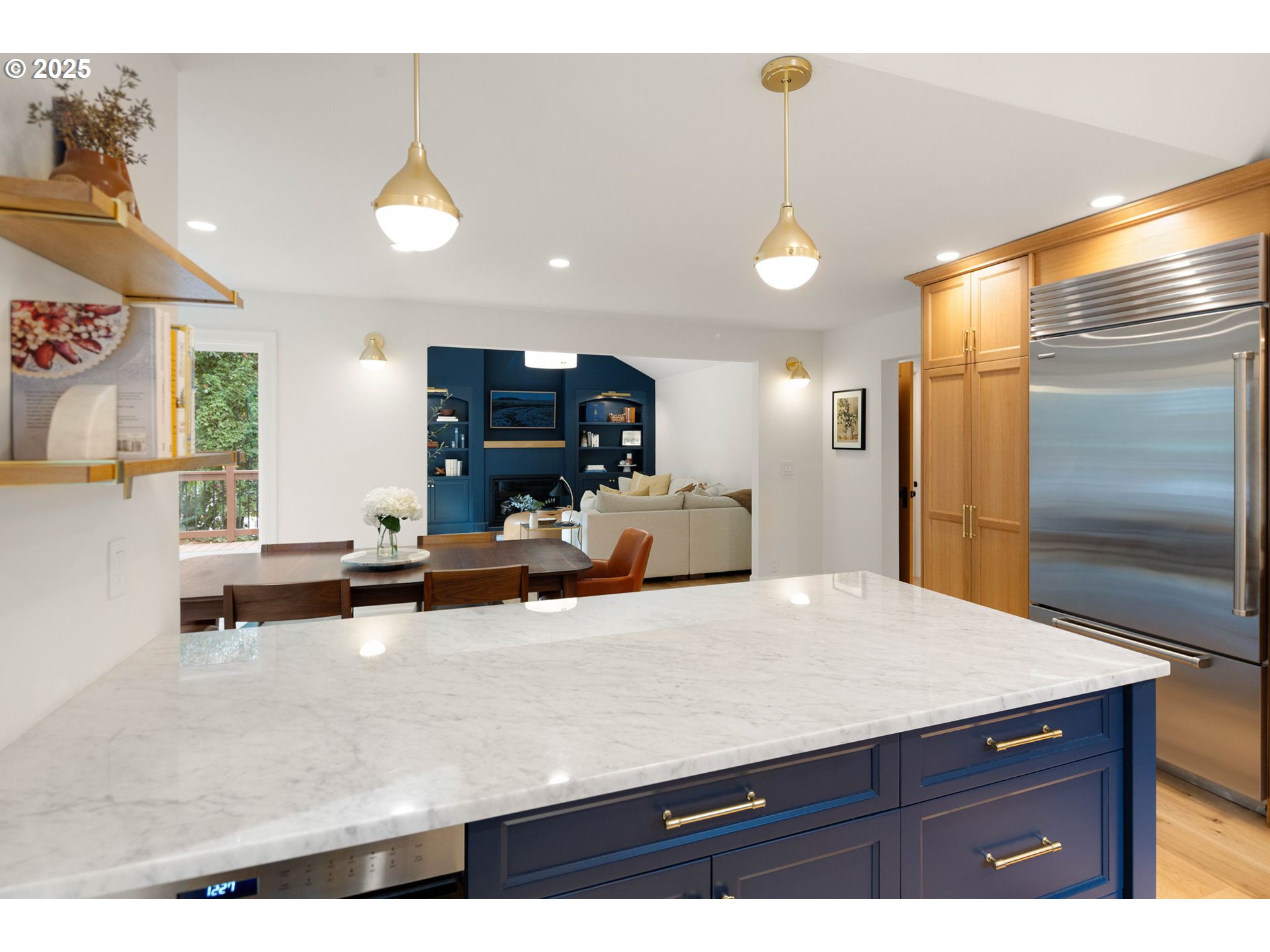 2214 West 25th Place Eugene, OR 97405 - Photo 17 of 48 a kitchen with a refrigerator and a sink
