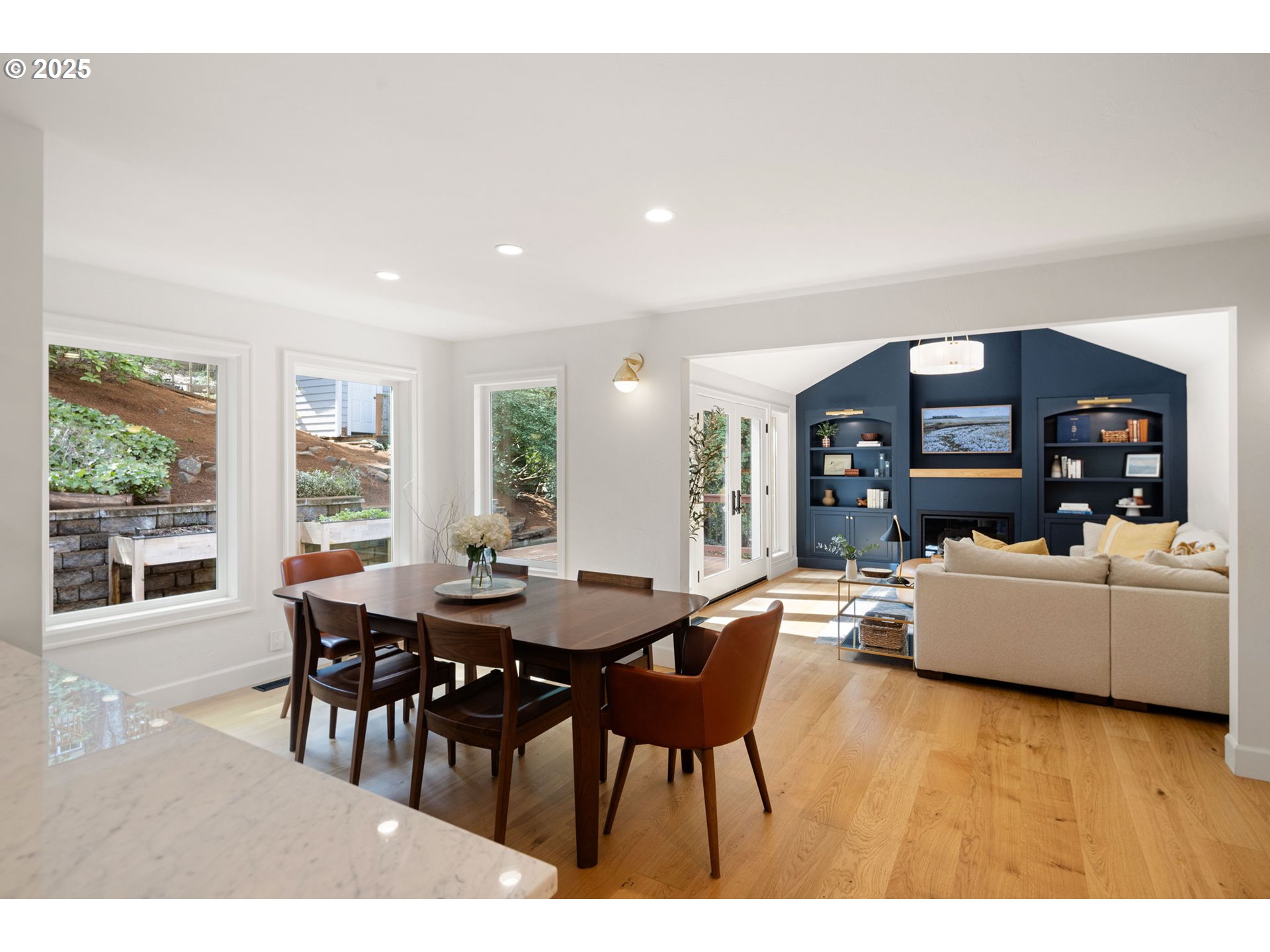 2214 West 25th Place Eugene, OR 97405 - Photo 18 of 48 a view of a dining room with furniture and wooden floor