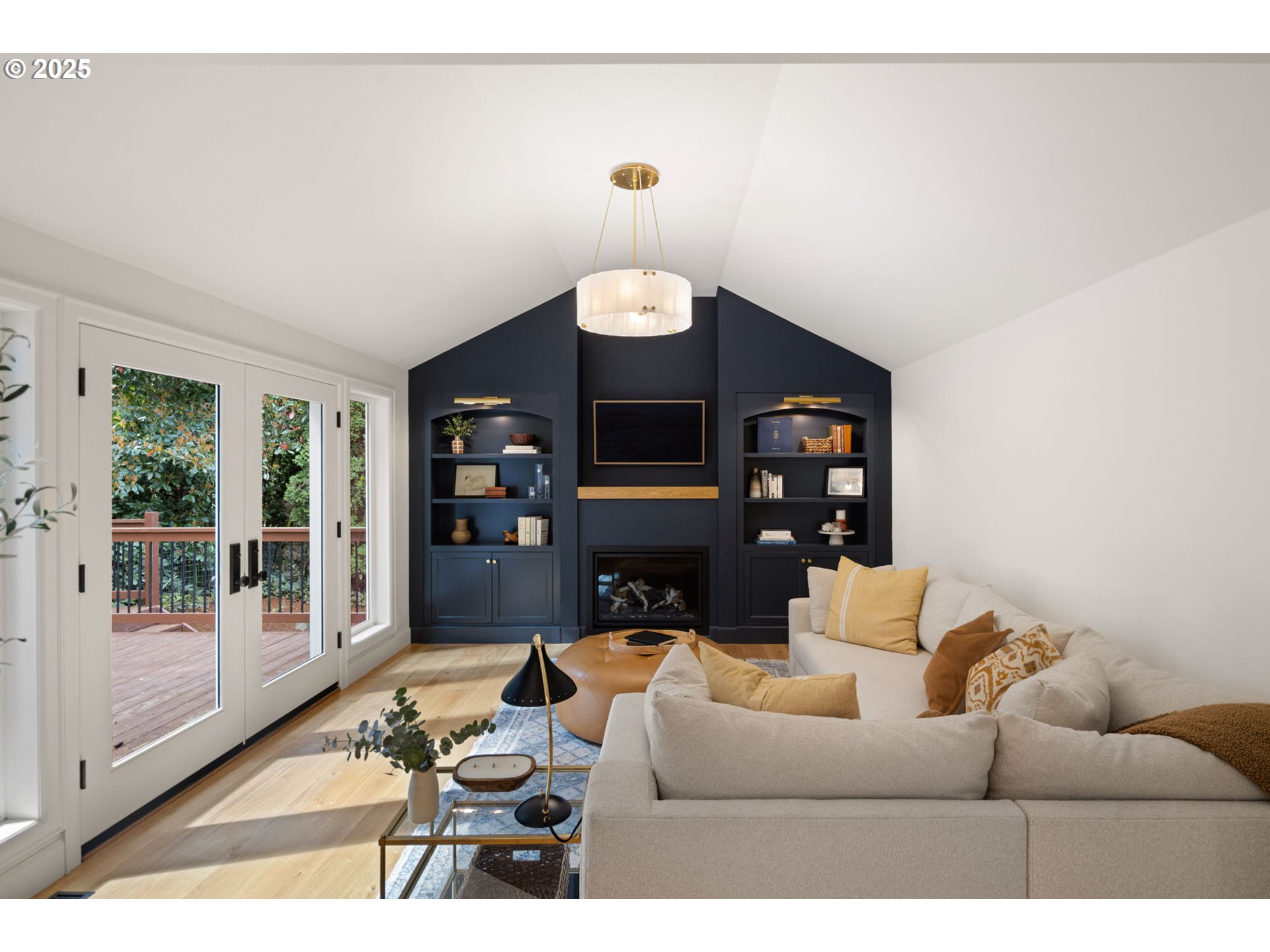 2214 West 25th Place Eugene, OR 97405 - Photo 19 of 48 a living room with furniture a window and a chandelier