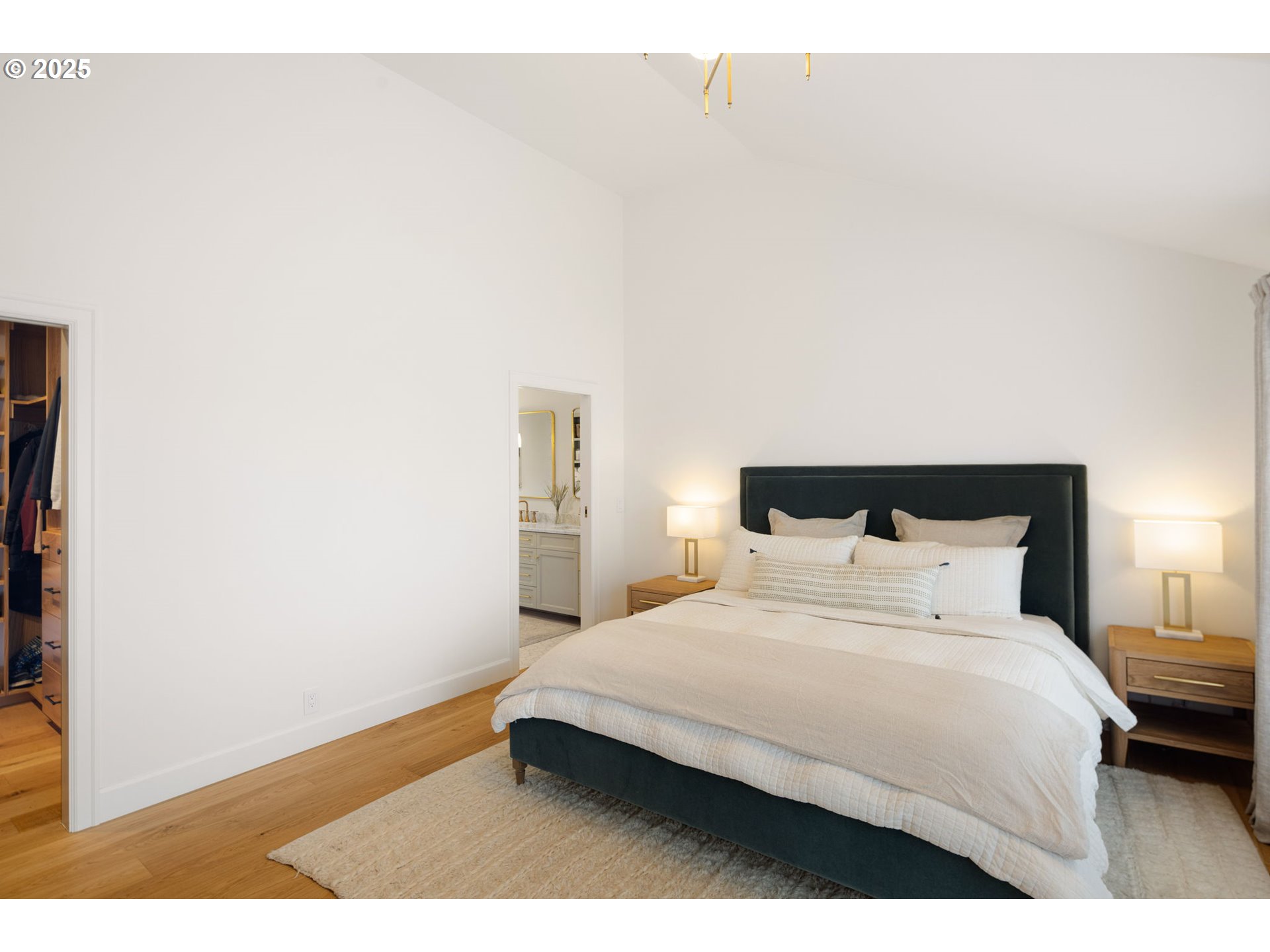 2214 West 25th Place Eugene, OR 97405 - Photo 25 of 48 a bedroom with a bed and a night stand