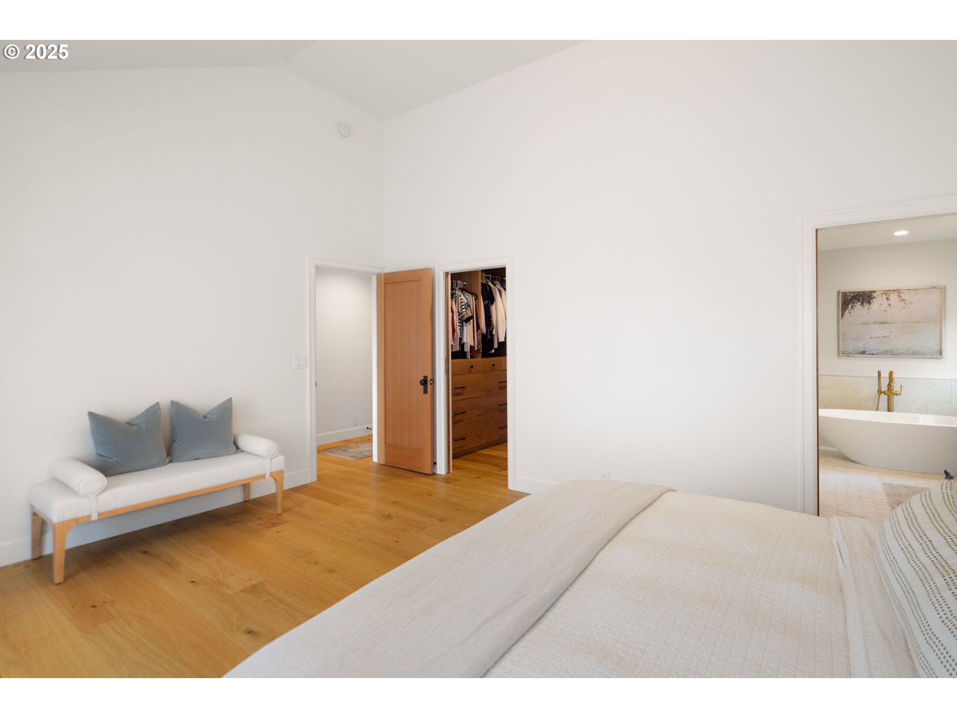 2214 West 25th Place Eugene, OR 97405 - Photo 26 of 48 a bedroom with a bed and a couch