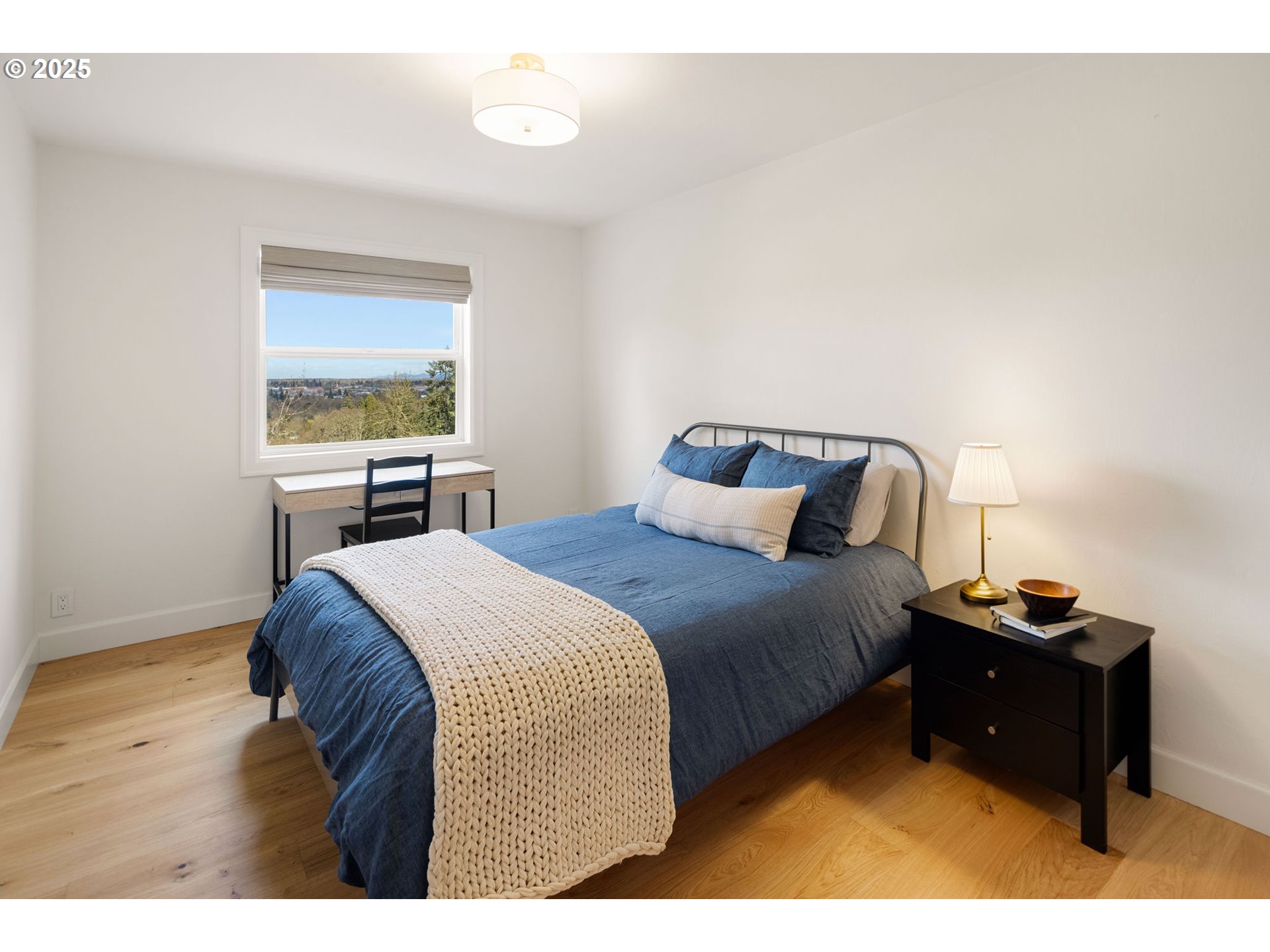 2214 West 25th Place Eugene, OR 97405 - Photo 37 of 48 a bedroom with a bed and a desk