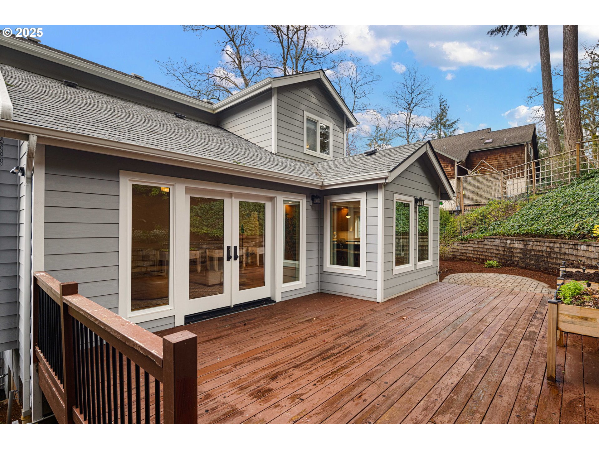 2214 West 25th Place Eugene, OR 97405 - Photo 43 of 48 a view of a house with wooden fence