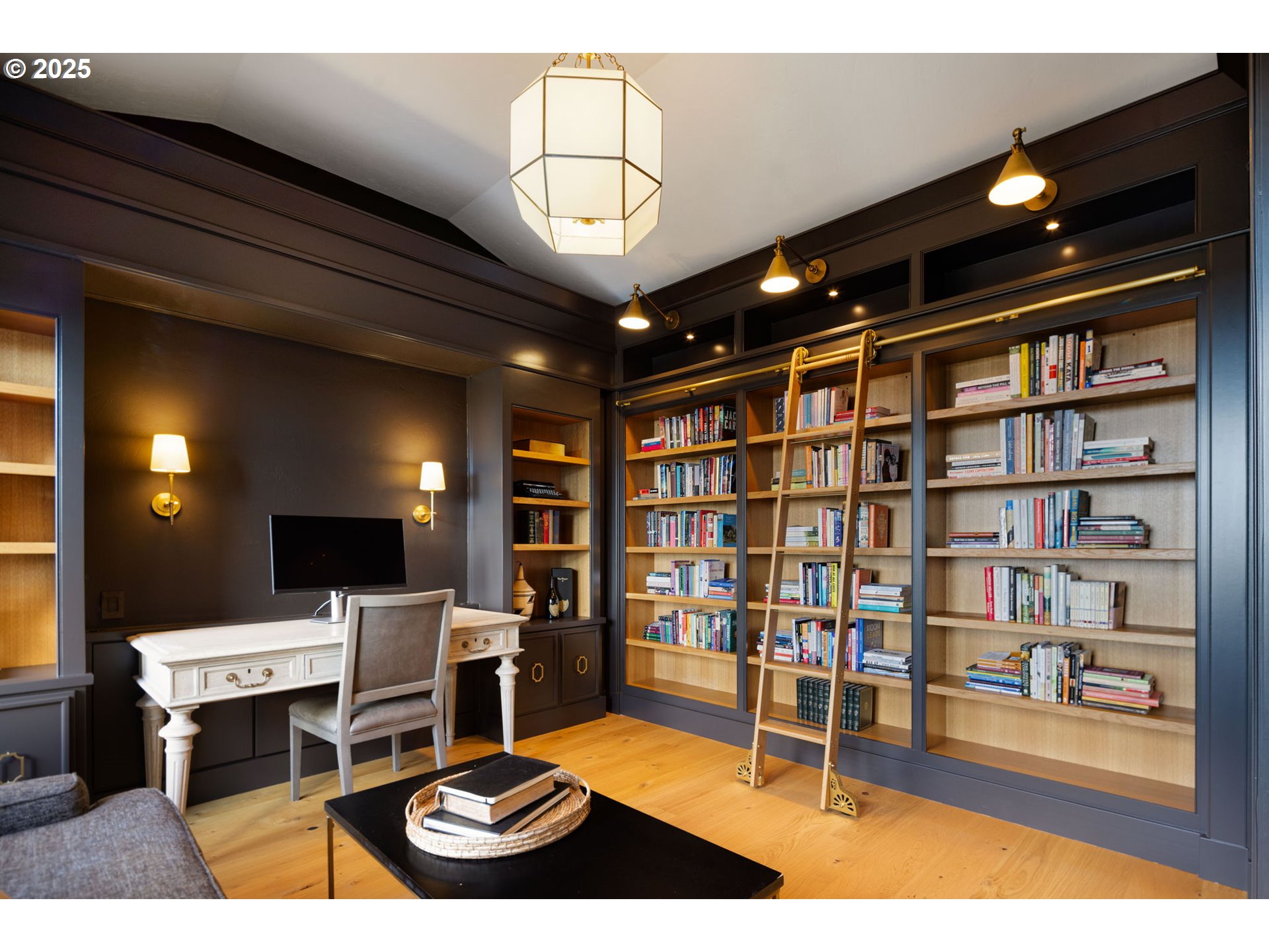 2214 West 25th Place Eugene, OR 97405 - Photo 7 of 48 a living room with furniture a chandelier and a bookshelf