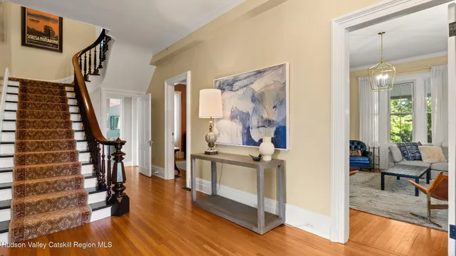 a bedroom with a bed and a fireplace