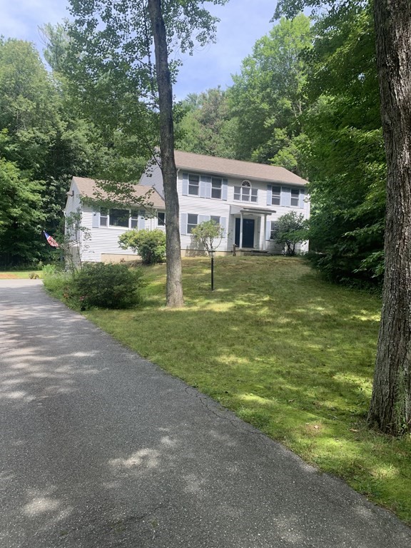 33 North Monson Road Hampden, MA 01036 - Photo 1 of 9 a front view of a house with a yard