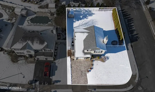 view of a house with a tree