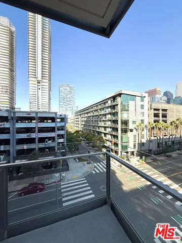 a view of balcony with a potted plant