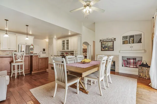 a bedroom with two beds and a window