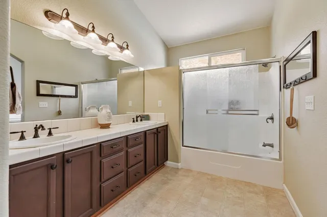 a view of a swimming pool with a patio