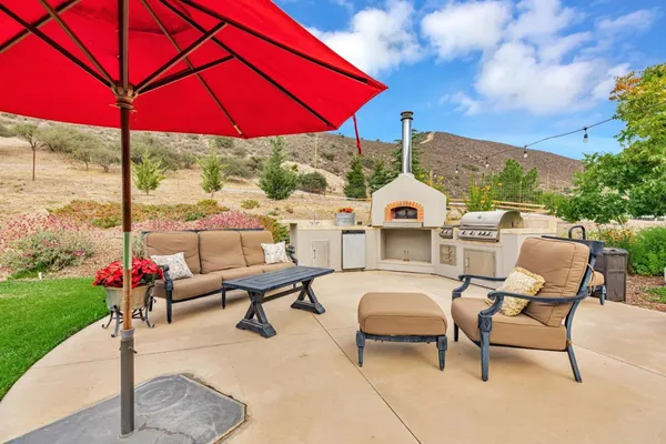 a view of a swimming pool with a patio