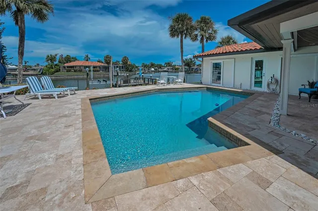 a bedroom with bed and window