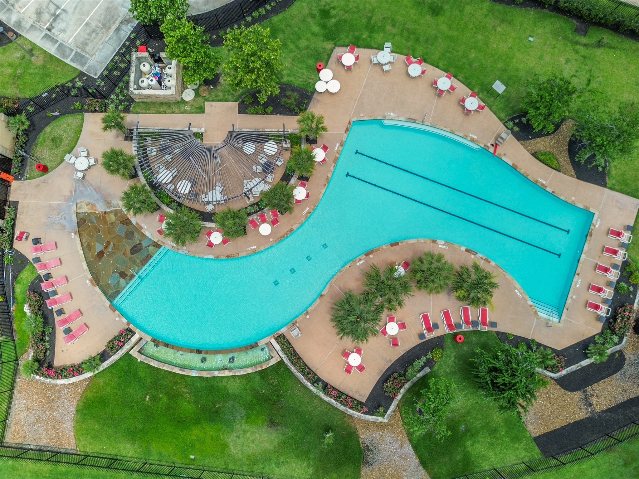 9426 Grand Spark Drive Rosharon, TX 77583 - Photo 26 of 31 Spend your summer days cooling off at the pool, where sunny afternoons are filled with swimming, laughter, and time spent with neighbors and friends.
