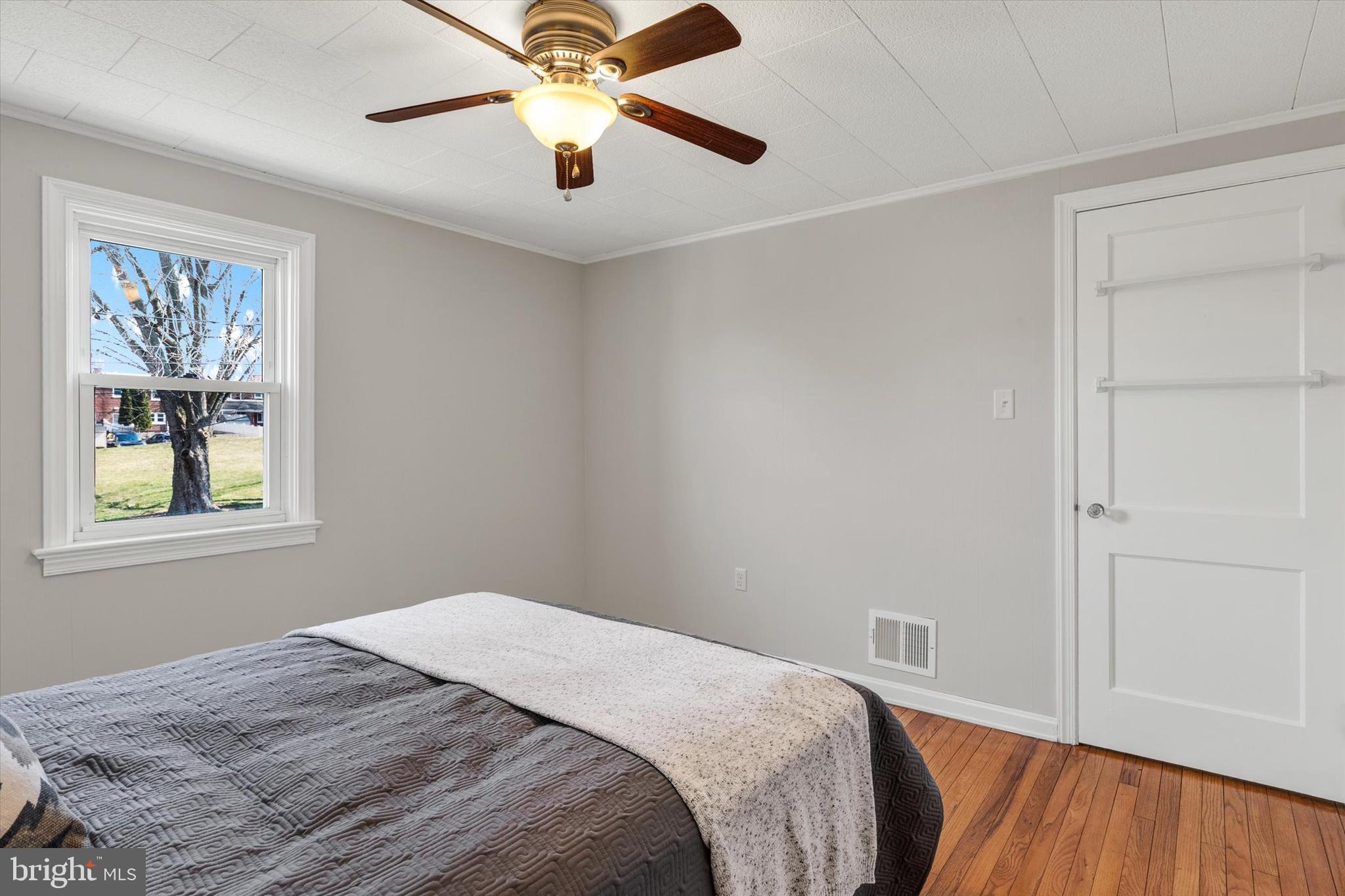 1218 Fremont Street Lancaster, PA 17603 - Photo 12 of 24 a bedroom with a bed and a window