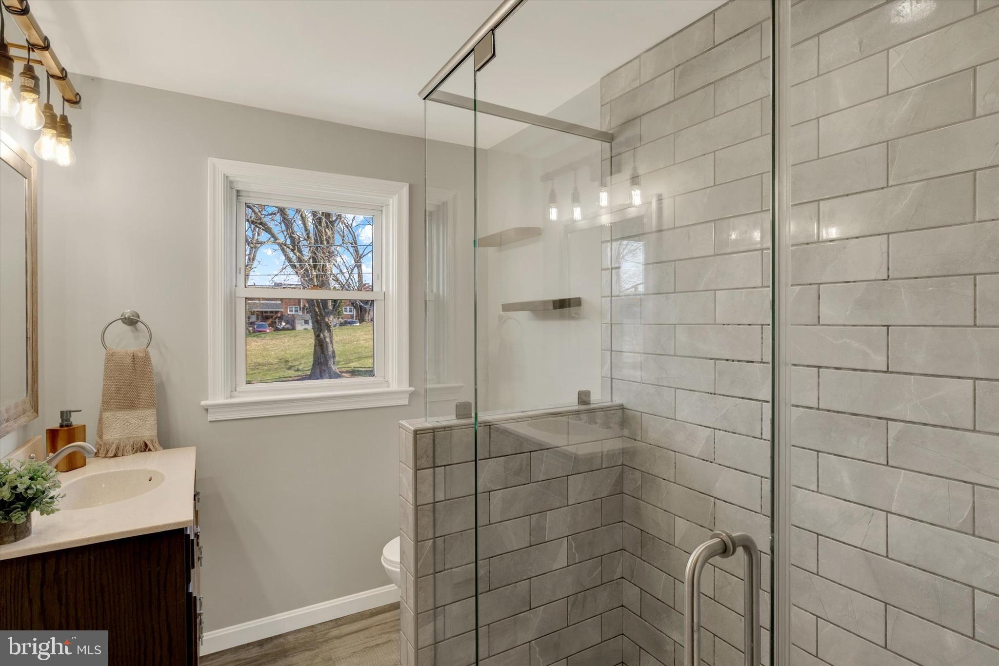 1218 Fremont Street Lancaster, PA 17603 - Photo 14 of 24 a bathroom with a sink shower and a mirror