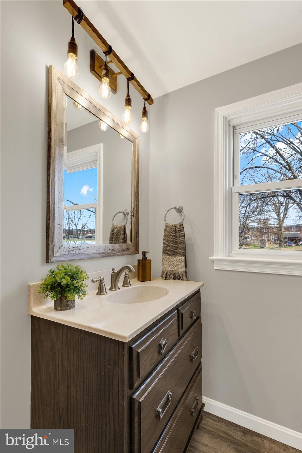 1218 Fremont Street Lancaster, PA 17603 - Photo 16 of 24 a bathroom with a sink and a mirror
